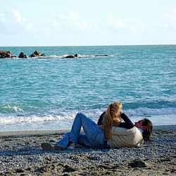 Beach Couple Romantic In Love Relaxing On Travel
